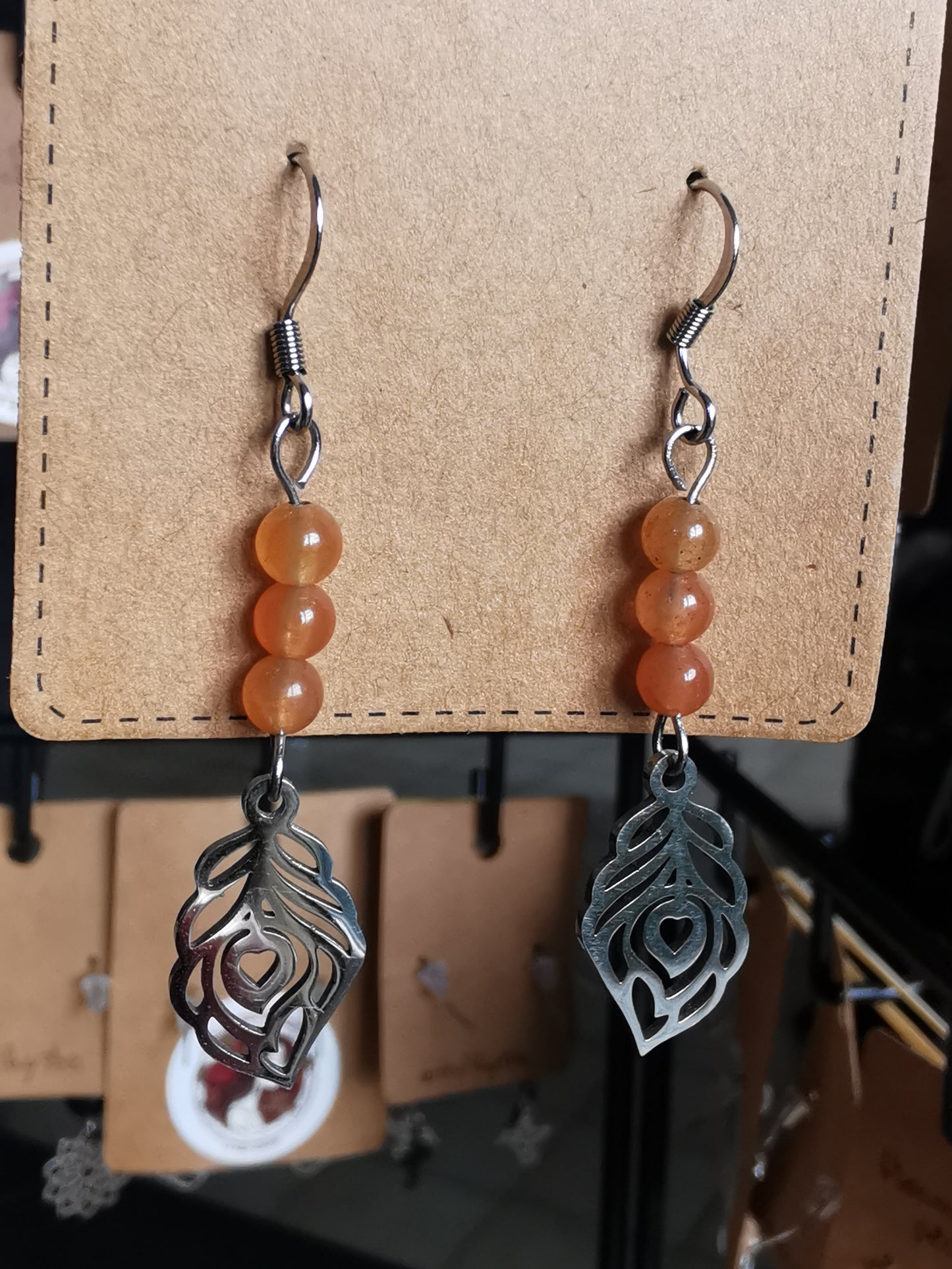 Boucles d'oreilles plumes cœur en pierres naturelles